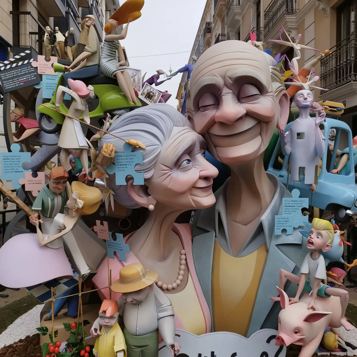 Falla monument of an elderly Valencian couple surrounded by small scenes from their memories