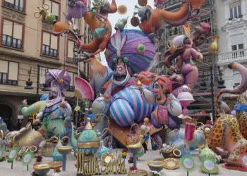 Arabian Nights themed falla monument with giant turbaned ninots in a street in central Valencia during Las Fallas